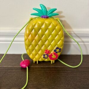 Polly Pocket Tropicool Pineapple
Wearable Purse Playset Mattel